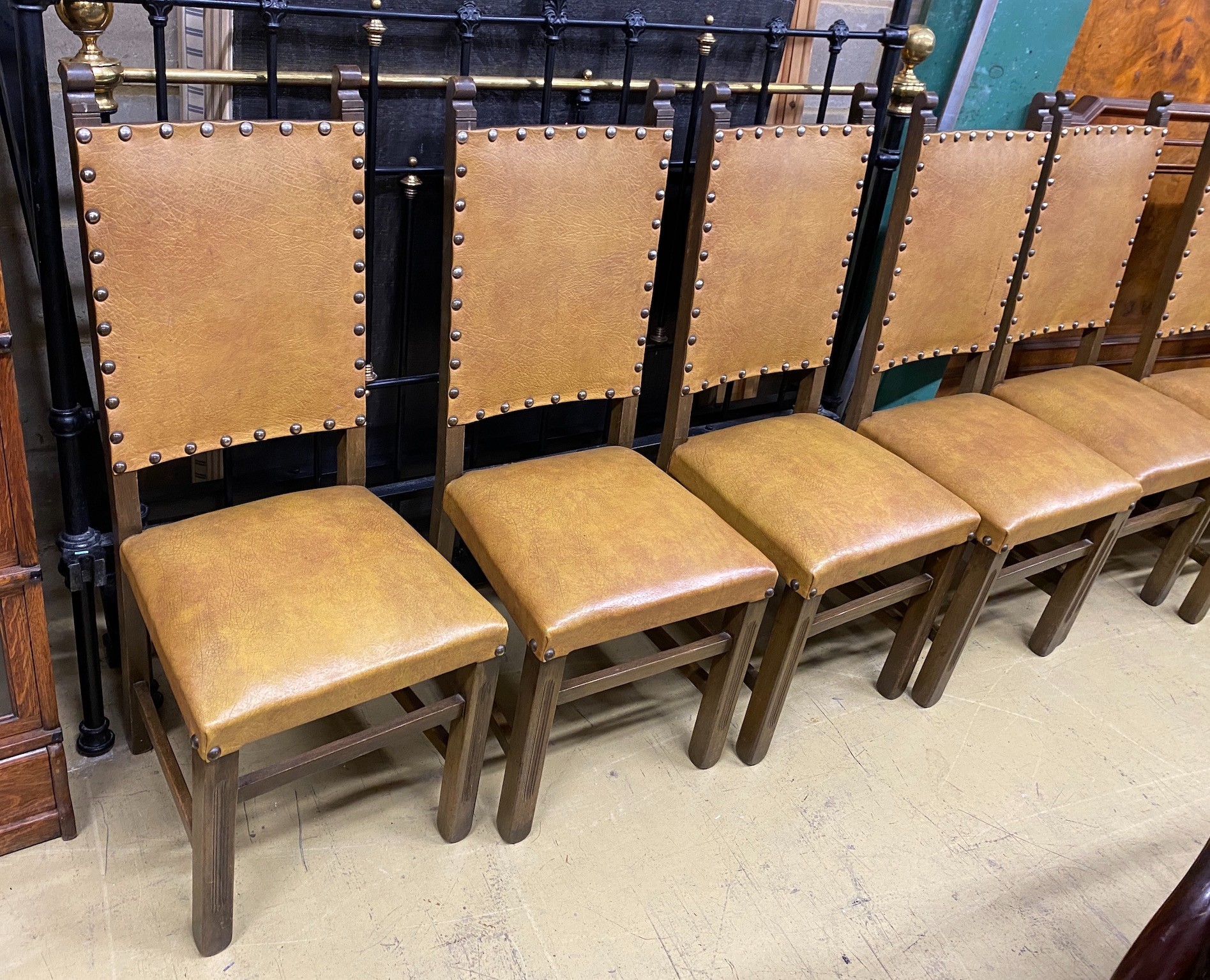 A set of eight 18th century style beech dining chairs